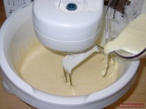 Stir the cream-egg white mixture into the dough. Ensure there are no lumps! Let the dough rest again.