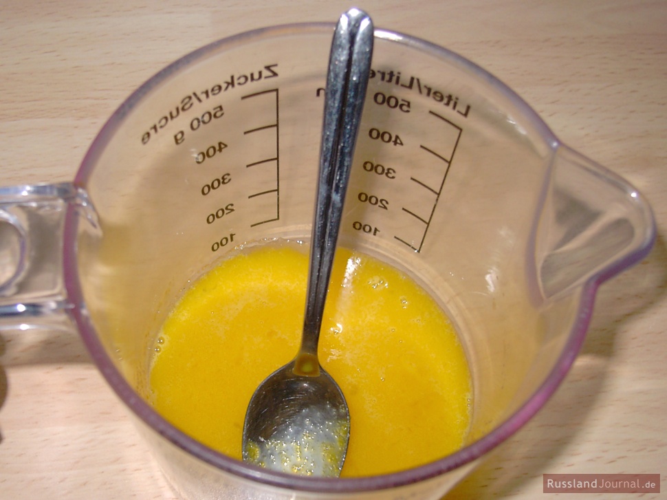 Separate the egg whites from the yolks. Thoroughly mix yolks with sugar.