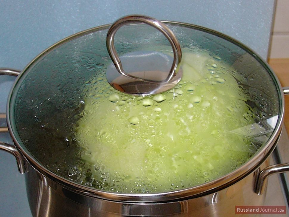 Wash cabbage and remove outer leaves. Place cabbage head in a large pan with boiling water, cover and simmer for about 15 minutes.