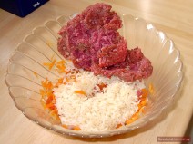 Add rice and ground beef, season to taste with salt and pepper and mix well.