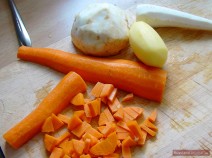 Wash, peel and chop vegetables. Wash buckwheat, rice or barley.