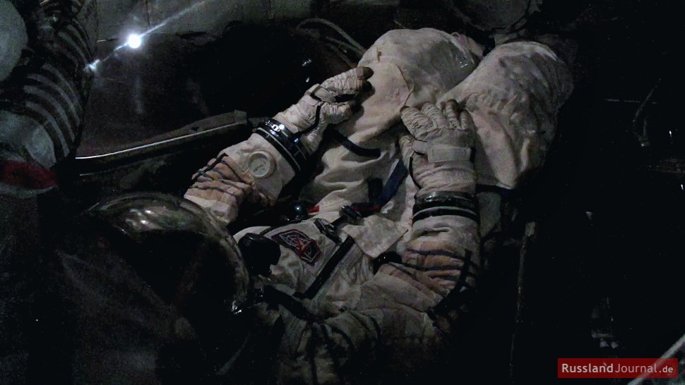 Kosmonaut im Lande-Modul