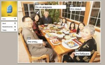 Am Tisch sitzende Familienmitglieder benennen bei einer Studio-Sitzung bei Rosetta Stone Russisch TOTALe